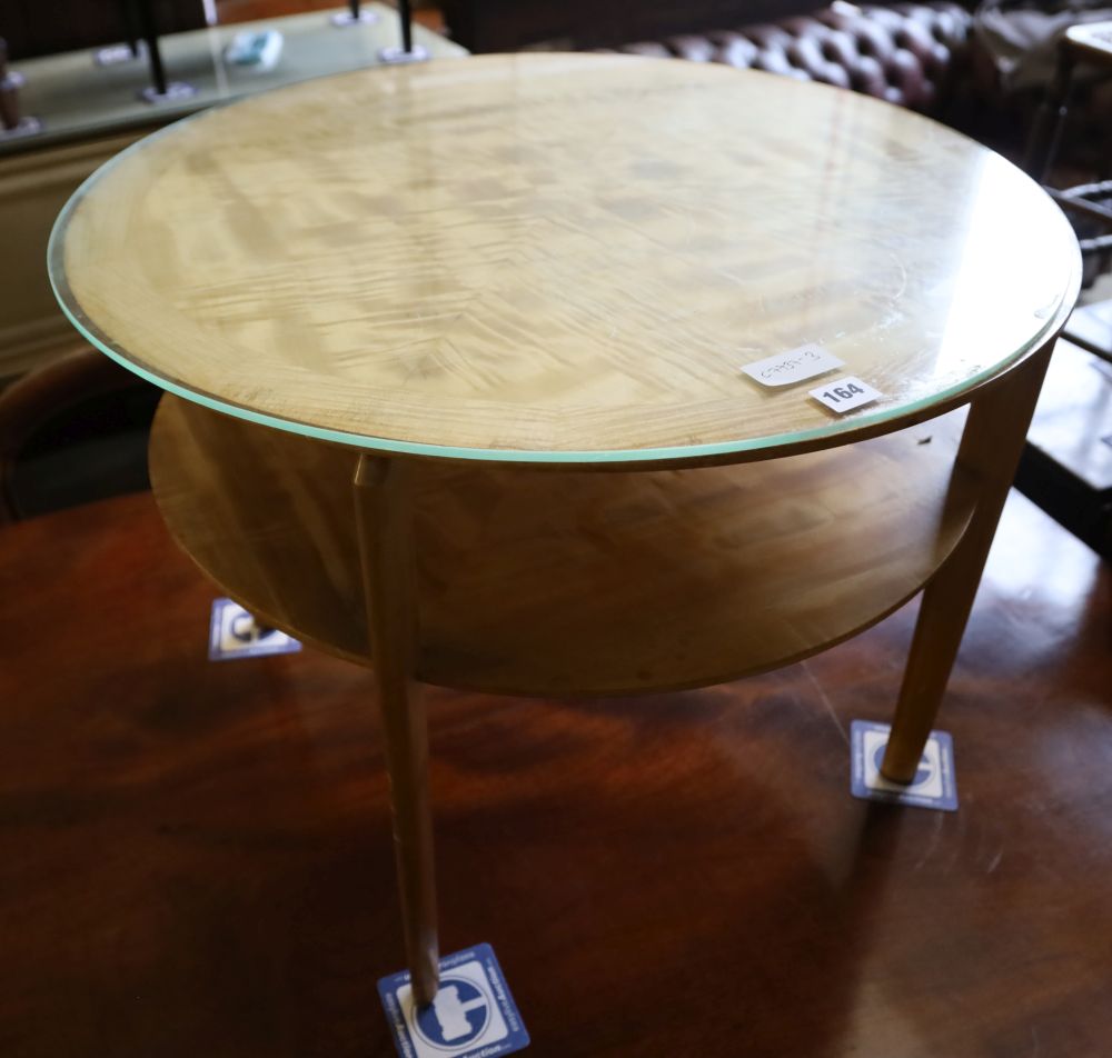 A 1950s satin maple circular occasional table, 64cm diameter, 52cm high